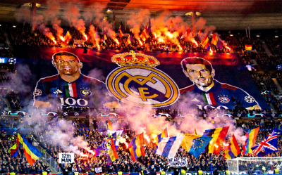 欧冠赛场球迷营造的震撼主场氛围与巨型tifo